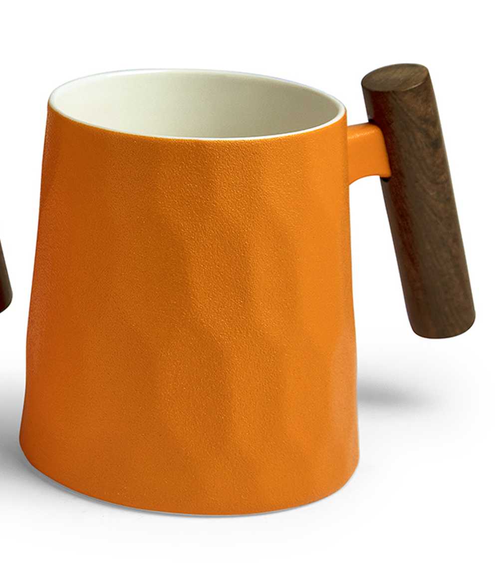 Bild von Clementine Tasse Henkelbecher Porzellan mit Holzgriff Wabenmuster